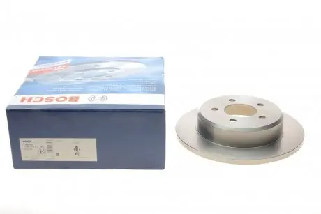 Диск тормозной (задний) Dodge Caravan/Jeep Cherokee 95-08 (290x12.4) (полный) BOSCH 0 986 479 102