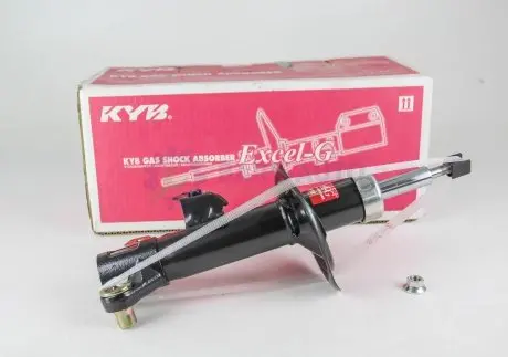 Амортизатор передній Nissan Primera 01- Пр. (газ) KYB 331014