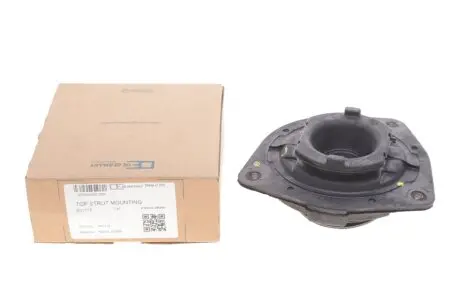 Подушка амортизатора (переднього) Nissan Qashqai 07- (L) OE Germany 801115